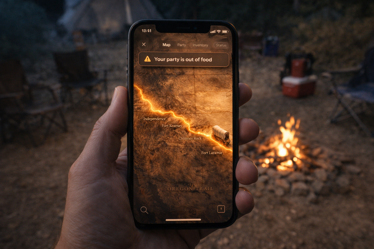 A phone displays 'Your party is out of food' by a campfire